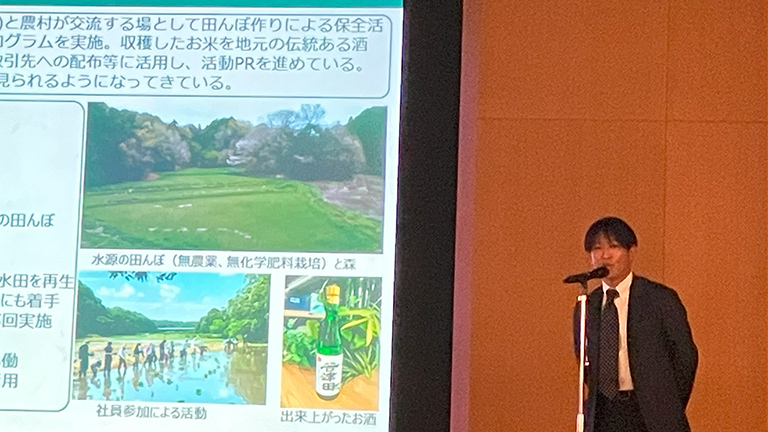 Explanation of the site at the certificate awarding ceremony